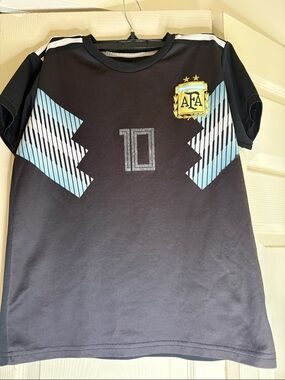 FA Kids Black Soccer Jersey with Light Blue Accents